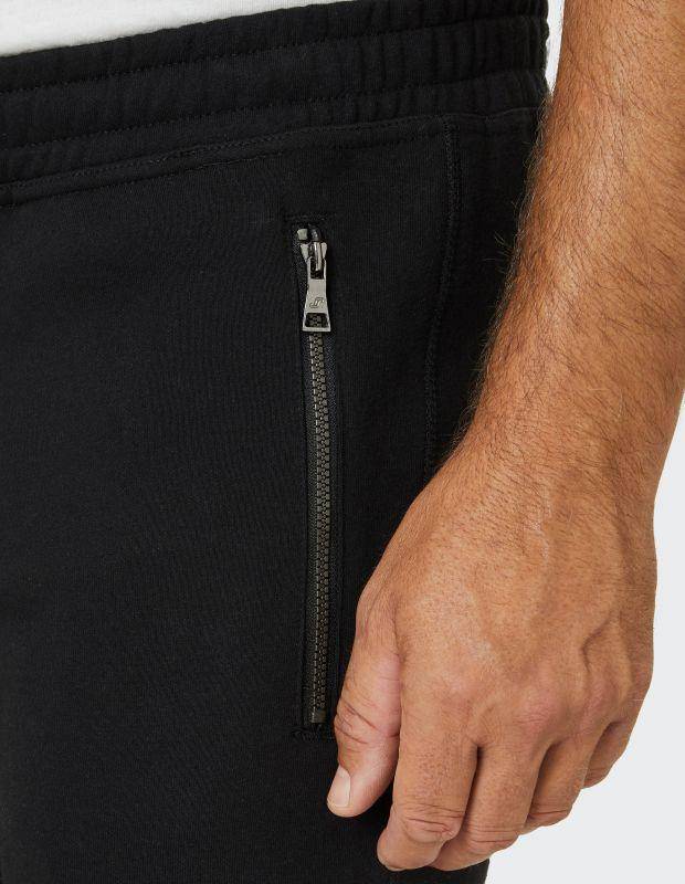 Joy Sportswear Freizeithose MAX Wärmende Hose mit modischem Zipper Fabrikverkauf
